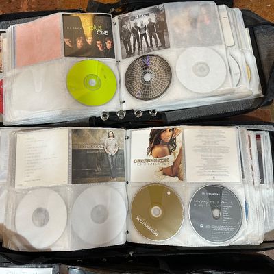 Huge CD Collection – 4 Large Binders – Hundreds of Country, Pop & Rock Albums