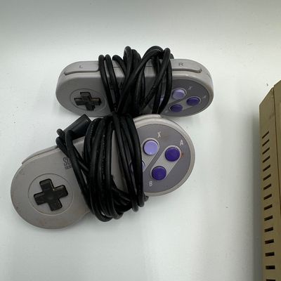 Vintage Super Nintendo SNES Console w/ 2 Controllers, Cords & Large Game Lot