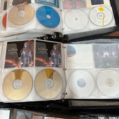 Huge CD Collection – 4 Large Binders – Hundreds of Country, Pop & Rock Albums