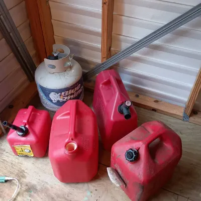 Propane Tank, 4 Gas Cans