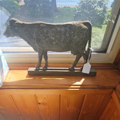 Sale Photo Thumbnail #23: Antique metal cow