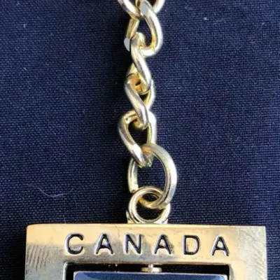 Vintage Canada Souvenir Keychain Lot – Spinning Flag Key Ring & House Charm Keychain