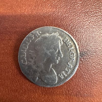 Silver Coin with Profile of Monarch and Crowned Emblem