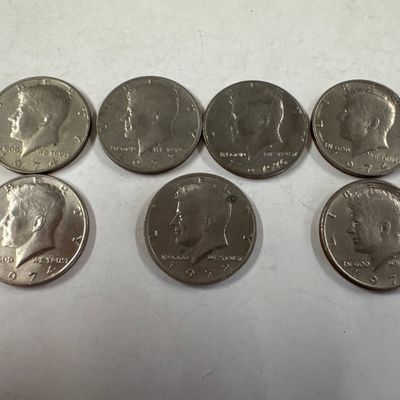 Collection of Seven Kennedy Half Dollar Coins