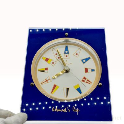 Sale Photo Thumbnail #133: Corum Admiral's Cup Blue Acrylic Desk and Wall Clock with Stand