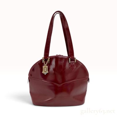 Sale Photo Thumbnail #148: A Vintage Yves Saint Laurent Burgundy Glossy Grain Leather Dome Shoulder Bag