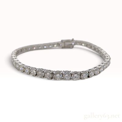 Sale Photo Thumbnail #167: An Important G-H VS1-VS2 10.368ctw Natural Diamond and Platinum Tennis Bracelet with 43 CGL Reports
