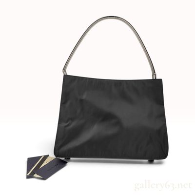 Sale Photo Thumbnail #264: Vintage Prada Cocco Black Nylon and Leather Shoulder Bag with Metal Handle