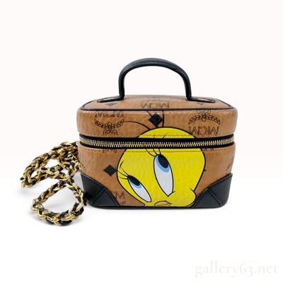 Sale Photo Thumbnail #150: MCM X Looney Tunes Tweety Rockstar Cognac Visetos Coated Canvas Vanity Case
