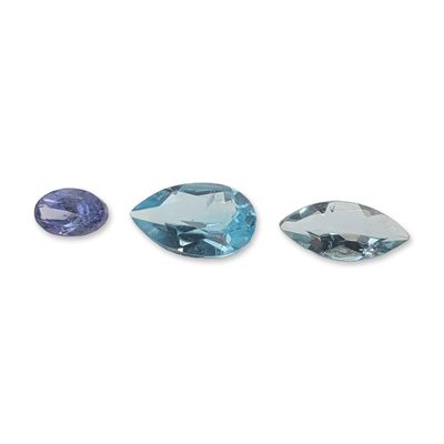 Group of Three Loose Faceted Blue Tanzanite, Topaz, and Citrine Gemstones