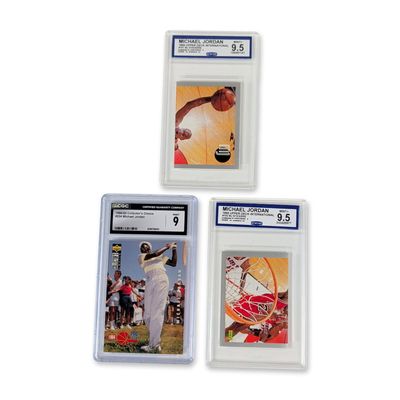 Sale Photo Thumbnail #319: 3pc Graded Michael Jordan Upper Deck Trading Cards and Sticker