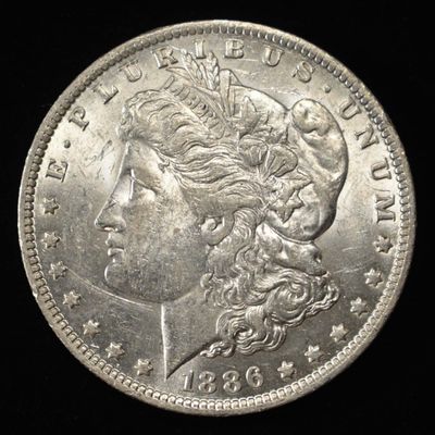 Sale Photo Thumbnail #104: 1886-O MORGAN DOLLAR AU/BU