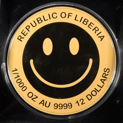 Sale Photo Thumbnail #426: 2026 REP OF LIBERIA SMILEY 1/1000TH OZ .9999 GOLD