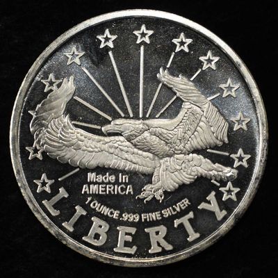 Sale Photo Thumbnail #406: MADE IN AMERICA 1 OZ .999 SILVER ROUND