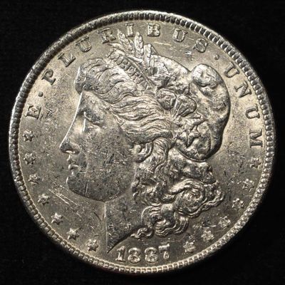 Sale Photo Thumbnail #106: 1887 MORGAN DOLLAR