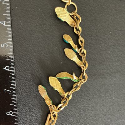 Gorgeous Vintage Gold Tone Bracelet with multi colored enamel hi heel charms