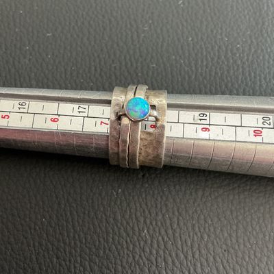 Vintage Silpada hammered silver spinner ring with faux opal