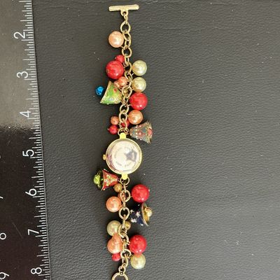 Very cute Vintage Christmas Charm Bracelet with a watch needs new battery