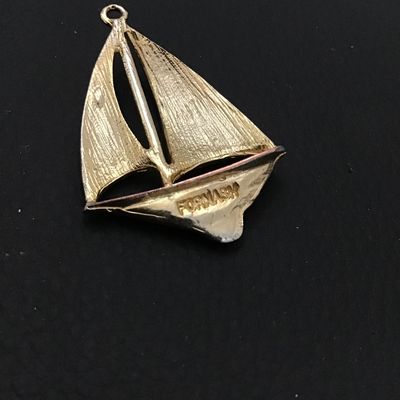 Gold tone vintage enamel sailboat pendant, marked Fornash
