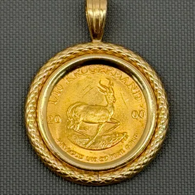 Sale Photo Thumbnail #22: 1/10th oz Gold Krugerrand and Bezel   