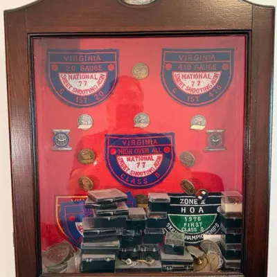 Display Case of Skeet Shooting and Other Shooting Awards