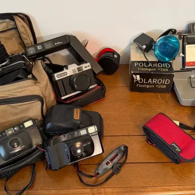 Lot Of Digital and Film Cameras From Canon, Minolta, Polaroid and Others
