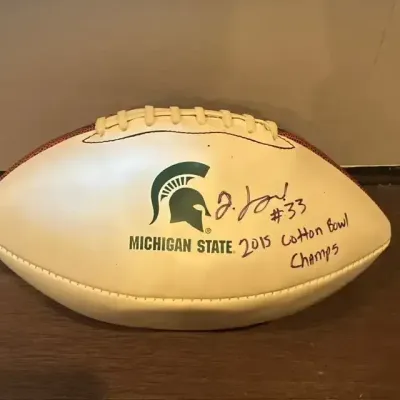 Sale Photo Thumbnail #28: Michigan state 2015 cotton bowl signed football
