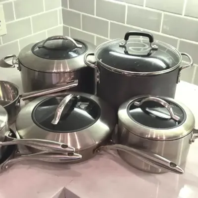 Sale Photo Thumbnail #68: Stainless cast iron pots and pans