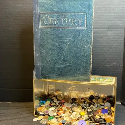 Vintage Buttons In A Tin Container With "The Century" Book On Antique Buttons