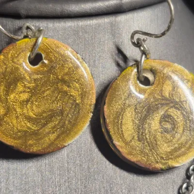 Stunning oval-shaped gemstone pendant, a Boulder Opal matrix & Earrings set