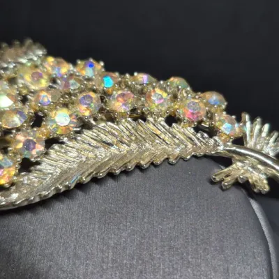 Sale Photo Thumbnail #10: Vintage BSK super sparkle Aurora Borealis Rhinestone BROOCH
> BSK produced until the 1960s from their NYC based factory.
Founded in 1948.
Brooch is in excellent condition, no loss of stones or damage ~ pin perfect