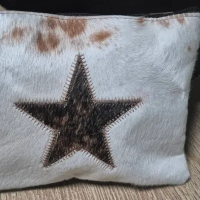 Sale Photo Thumbnail #4: Pair custom Cowhide Cosmetic Bags ~ Cowhide fronts / leather backs
< perfect for storing all your cosmetic essentials.
Made from durable grade A cowhide.
< one with Star / other cowhide grain....
> zipper tops Size: 9 x 7