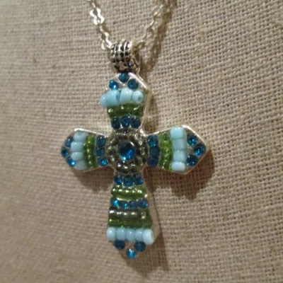 Sale Photo Thumbnail #9: Blue crystals Turquoise seed beads silver tone 18" long Cross
 Necklace in Excellent like NEW Condition. Cross measures 1 1/2" tall.