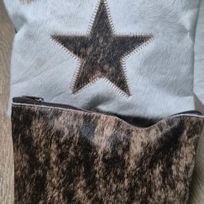 Sale Photo Thumbnail #3: Pair custom Cowhide Cosmetic Bags ~ Cowhide fronts / leather backs
< perfect for storing all your cosmetic essentials.
Made from durable grade A cowhide.
< one with Star / other cowhide grain....
> zipper tops Size: 9 x 7
