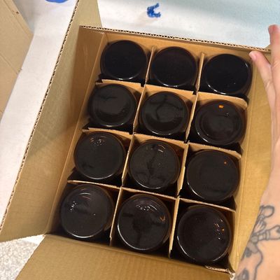 56 - Twelve 16oz Amber Glass Containers