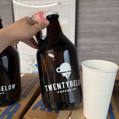 4 - Two Boxes of Amber Growlers