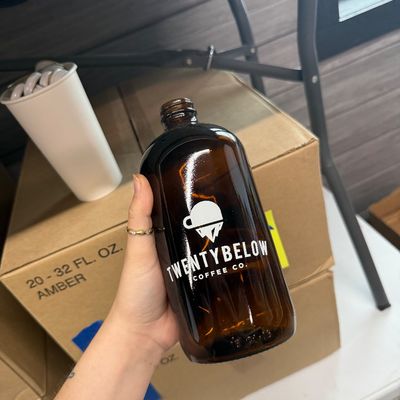 31 - Two Boxes of 32oz Amber Glass Containers