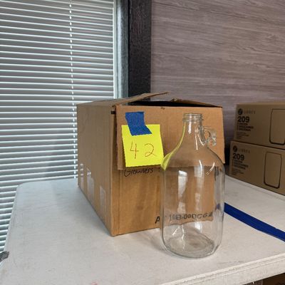 42 - 1/2 Gallon Clear Growlers