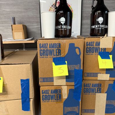 3 - Two Boxes of Amber Growlers