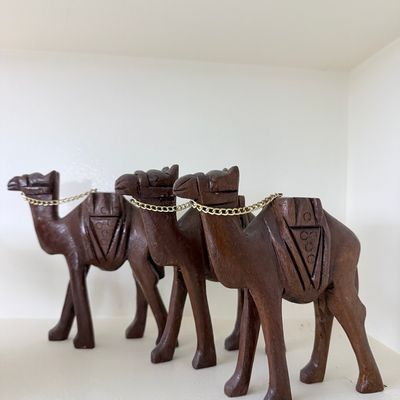 Sale Photo Thumbnail #173: Vintage Hand Carved Olive Wood Camel Figurines with Chains