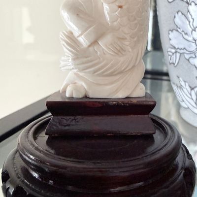 Sale Photo Thumbnail #99: Carved Bone Netsuke-Style Sculpture of Child with Fish