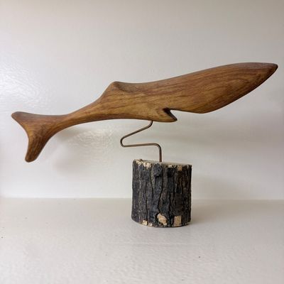 Sale Photo Thumbnail #113: Hand-Carved Wooden Whale Sculpture on Bark-Edged Log Base