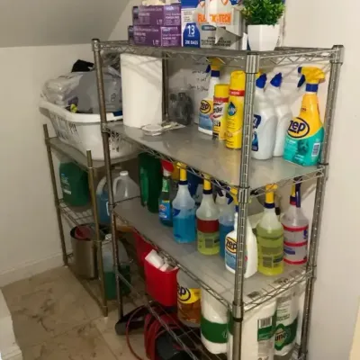 2 Metal Wire Racks Shelving with Cleaning Supplies andPaper Goods