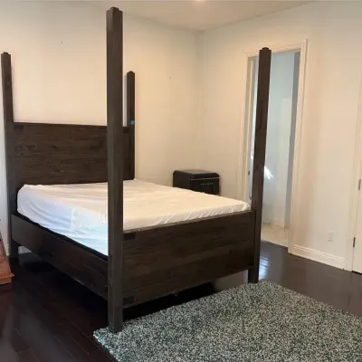 Four-poster Queen Size Wood Bed and Foot Rug