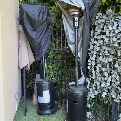 2 Outdoor Heaters and Outdoor Umbrella, Not Tested