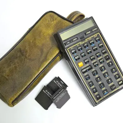Vintage HP 41C Calculator with 82106A Memory Modules & Financial Decisions Pac Overlay