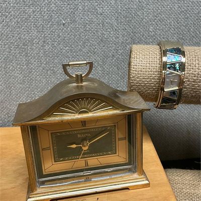 Sale Photo Thumbnail #135: Lot # : 152 - Bulova Tabletop Clock & Abalone Bangle Watch
