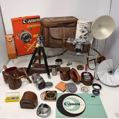 Sale Photo Thumbnail #34: VINTAGE CANON 35MM RANGEFINDER CAMERA OUTFIT with LENSES, FLASH UNITS, CASES & ACCESSORIES 