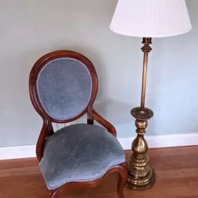 Antique Velvet Chair and Brass Lamp
