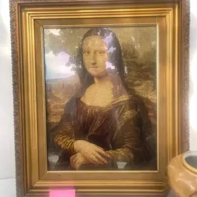 Hand Needlepointed Picture Of Mona Lisa And a Mona Lisa Vase